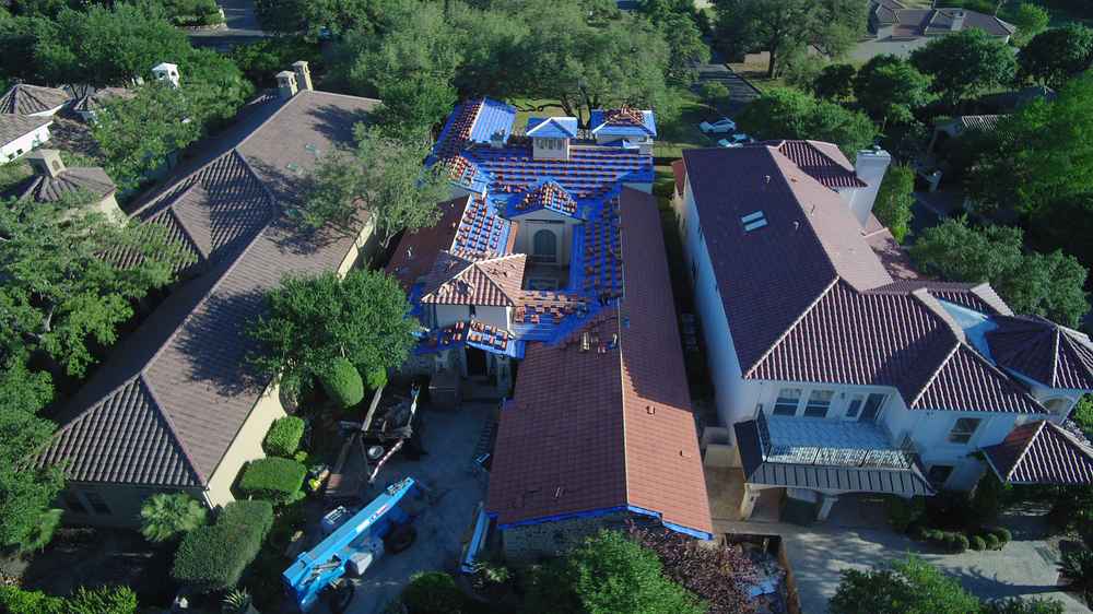 Aerial view of tile roofing installation